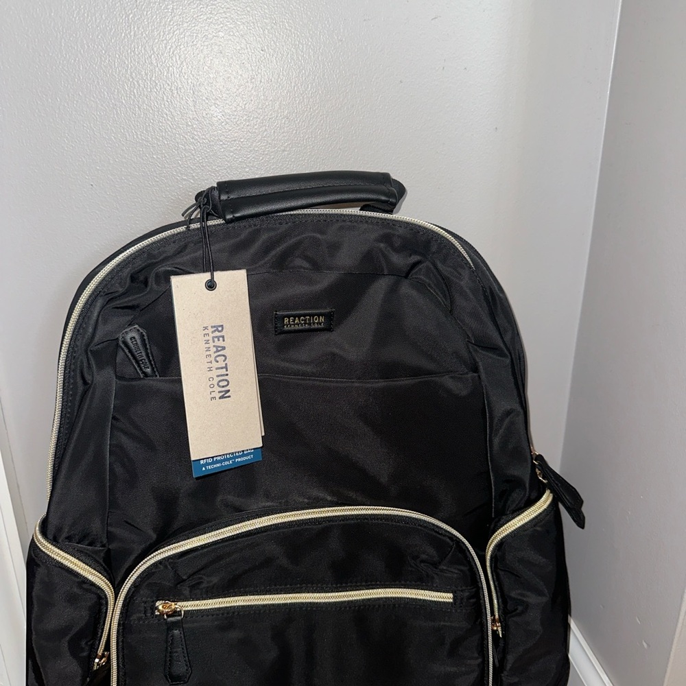 Reaction Kenneth Cole Black Backpack with Gold Details